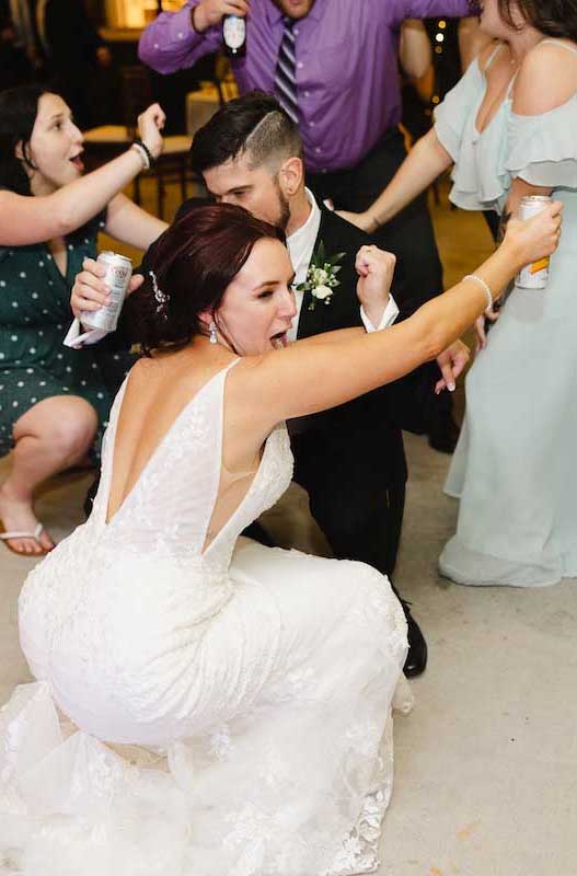 Bride getting low to wedding dj beats